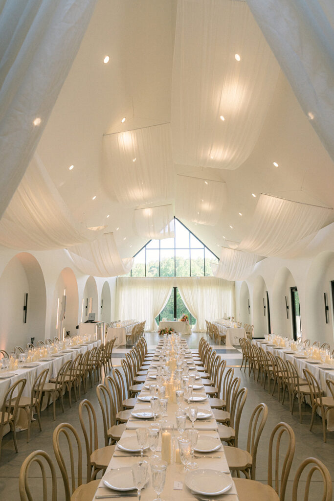 Dramatic drapery hanging from the ceiling in wedding reception space at The Lumen House